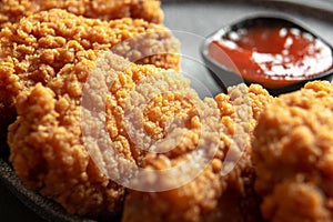 Close up. Fried pakora or Pyaj Pakoda or as Crispy Kanda bhaji, Bhajji, bajji, favourite Indian snack during the rainy photo