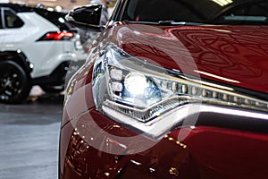 Close-up of the front light of a modern car. Exterior details