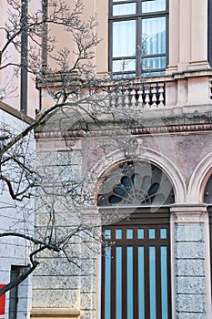 Close up front view of the old building in Europe concept photo. Urban architectural photography.