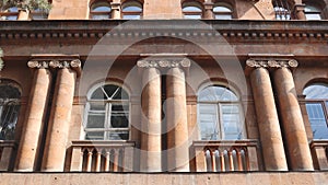 Close up front view of the old building in Yerevan concept photo. Urban architectural photography