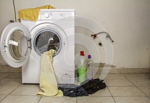 Close up front view of a washing machine door open