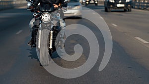 Close-up Front View of Young Bikers on Riding Motorcycle in Urban Background 4k