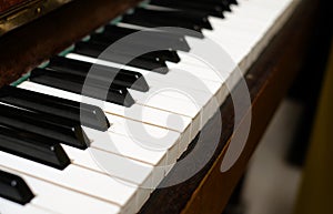 Close up frontal view of piano keys. Learning to play a musical instrument.