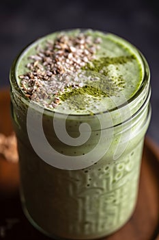 close up of frothy green tea protein powder shake - generative Ai illustration