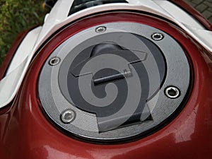 Close up of Fuel tank pit on a motorcycle vehicle.