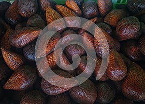 close up full view photo of fresh snakefruit in the market