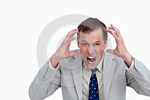Close up of furious yelling businessman