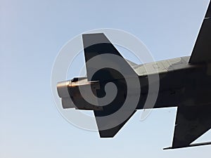 close up fuselage and tail of jet military air plane