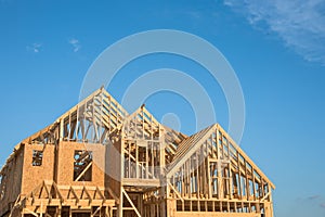 Close-up gable roof wooden house construction