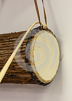 Close up of Gangan or Talking drum face and kongo, a Nigeria Yoruba musical instrument.
