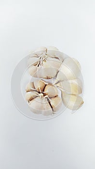 Close up garlic or bawang putih isolated on white background photo