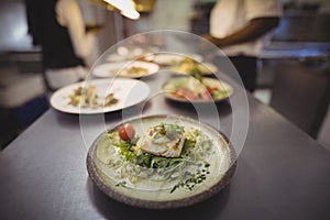 Close-up of garnished food served in plate