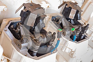 Close up of gas booster compressor engine component , cam shaft and intake, exhaust valve retainer , spark plug