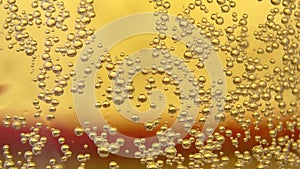 Close-up of gas bubbles in a beer mug. slow motion