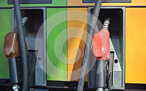 Close-up of the gas station in the gas station. Close the fuel injector in the petrol and diesel fuel dispenser in the station.