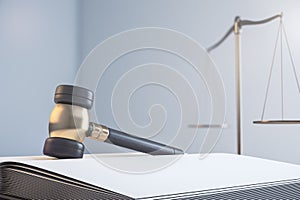 Close up of gavel, book and scales on light mock up backdrop. Law and jurisdiction concept. 3D Rendering