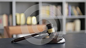 Close Up of Gavel on Lawyer Court Room Table