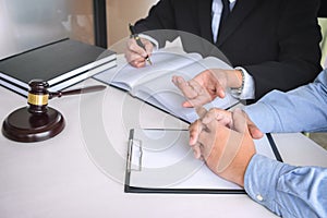 Close up of gavel, Male lawyer or judge Consult with client and