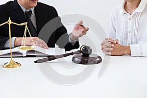 Close up of gavel, Male lawyer or judge Consult with client and