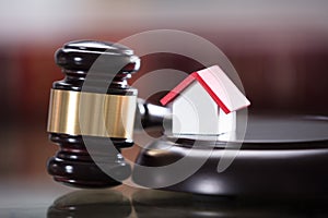 Gavel With Small House Model photo