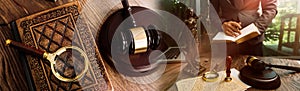 Close up gavel on white desk with Male judge reading legal books background.justice and law concept