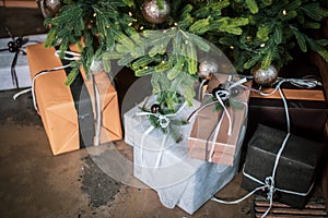 Close up. Gift boxes under the Christmas tree