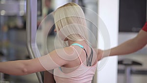 Close up of girl doing butterfly exercises