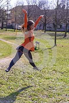 Close-up of girl holding crystal ball. Photo outside.