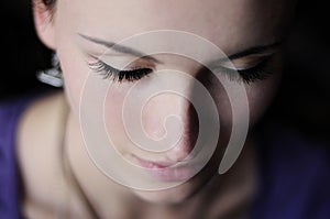 Close up girl portrait with long lashes