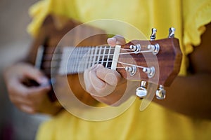 Close up of girl with ukulele