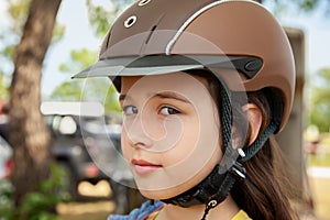 Close up of a Girl Waiting for a Horse Riding Lesson