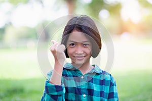 Close up of girls smiling face.Summertime, golden hour, sunset. SSTKHome