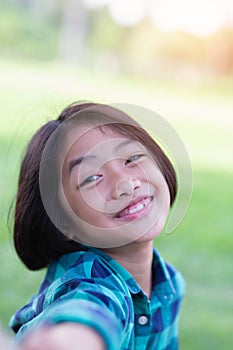 Close up of girls smiling face.Summertime, golden hour, sunset. SSTKHome