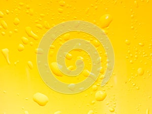 Close-up of glass of beer with drops