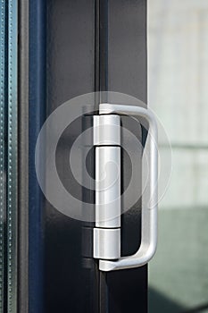Close up on  Glass Door Handle, Lock & Hinge