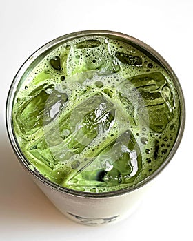 Close up of a glass iced matcha latte