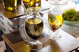 Close up of glass jug with extra vergin olive oil