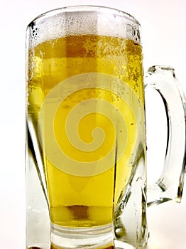Close up of a glass mug of beer