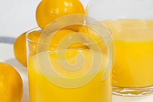 Close-up glass of natural orange juice
