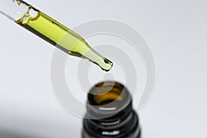Close up of a Glass Pipette With CBD Oil