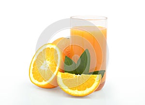 Close-up of Glass squeezed orange juice and fresh fruits ripe cut half with green leaves Fruit organic from natural food vegetari