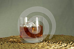 Close-up of glass of whiskey with ice