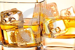 Close-up of a glass of whiskey with ice