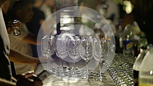 Close up of glasses for wine. People order drinks in bar