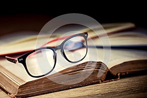 Close up glassess on old books