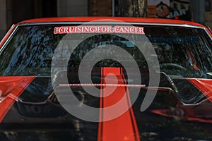 Close-up of a glossy red Chevrolet Corvette car in Manchester, the United States