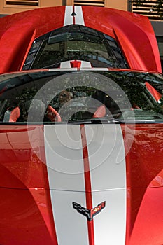 Close-up of a glossy red Chevrolet Corvette car in Manchester, the United States