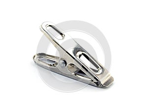 close-up glossy silver aluminium metal clothespin isolated on white background