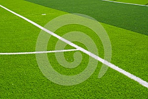 Close-up of the goal and touchline of a brand new football stadium