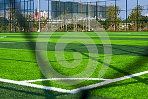 Close-up of the goal and touchline of a brand new football stadium